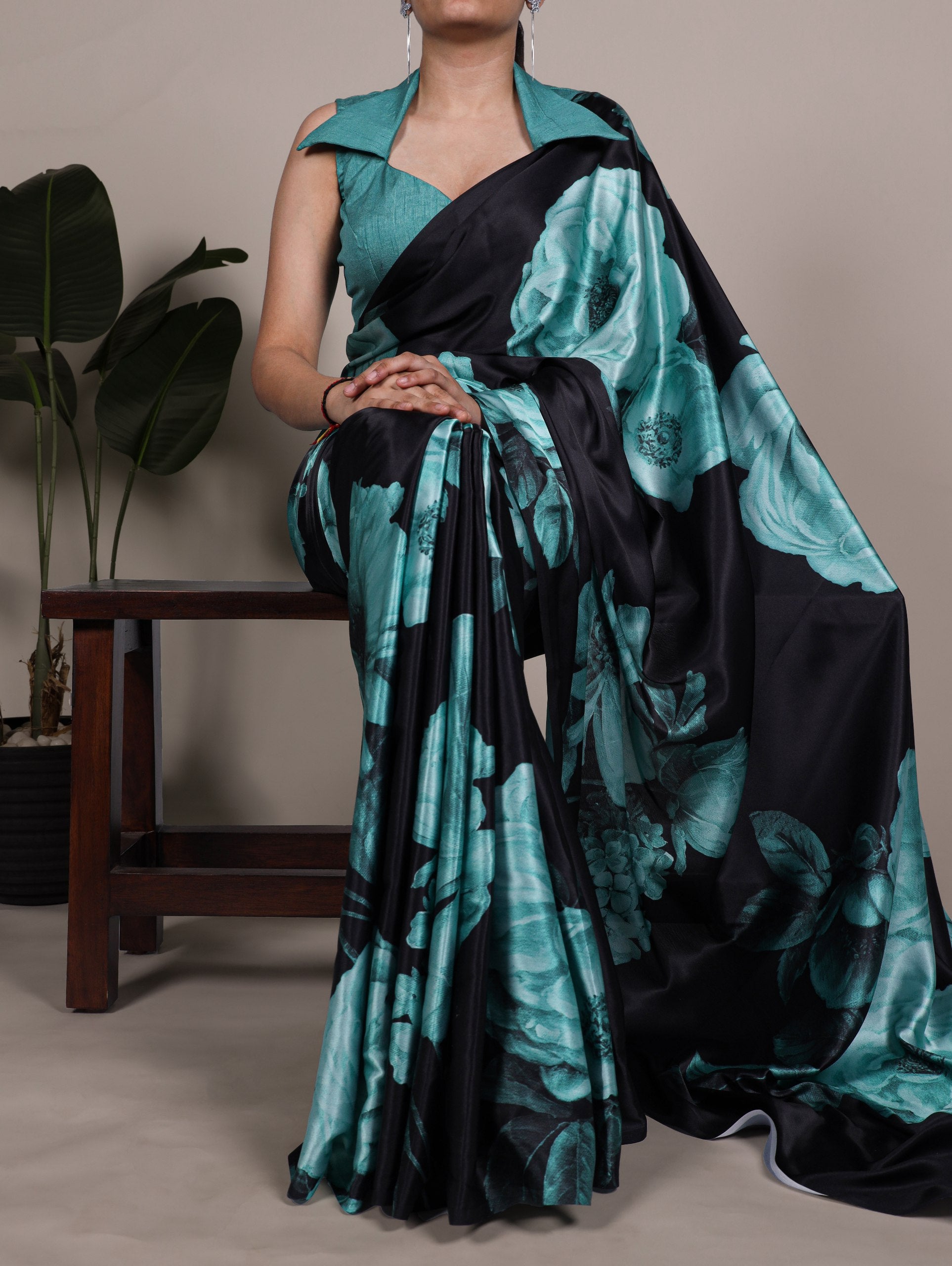 A saree that blends floral charm with satin smoothness