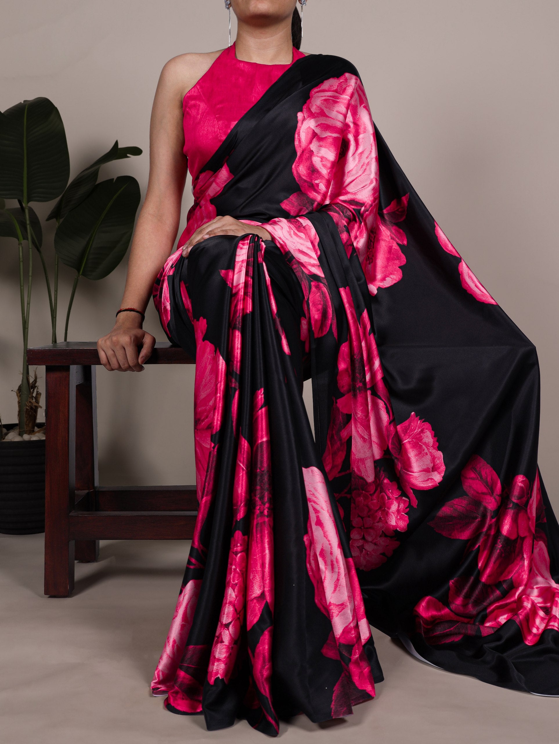 A saree that blends floral charm with satin smoothness