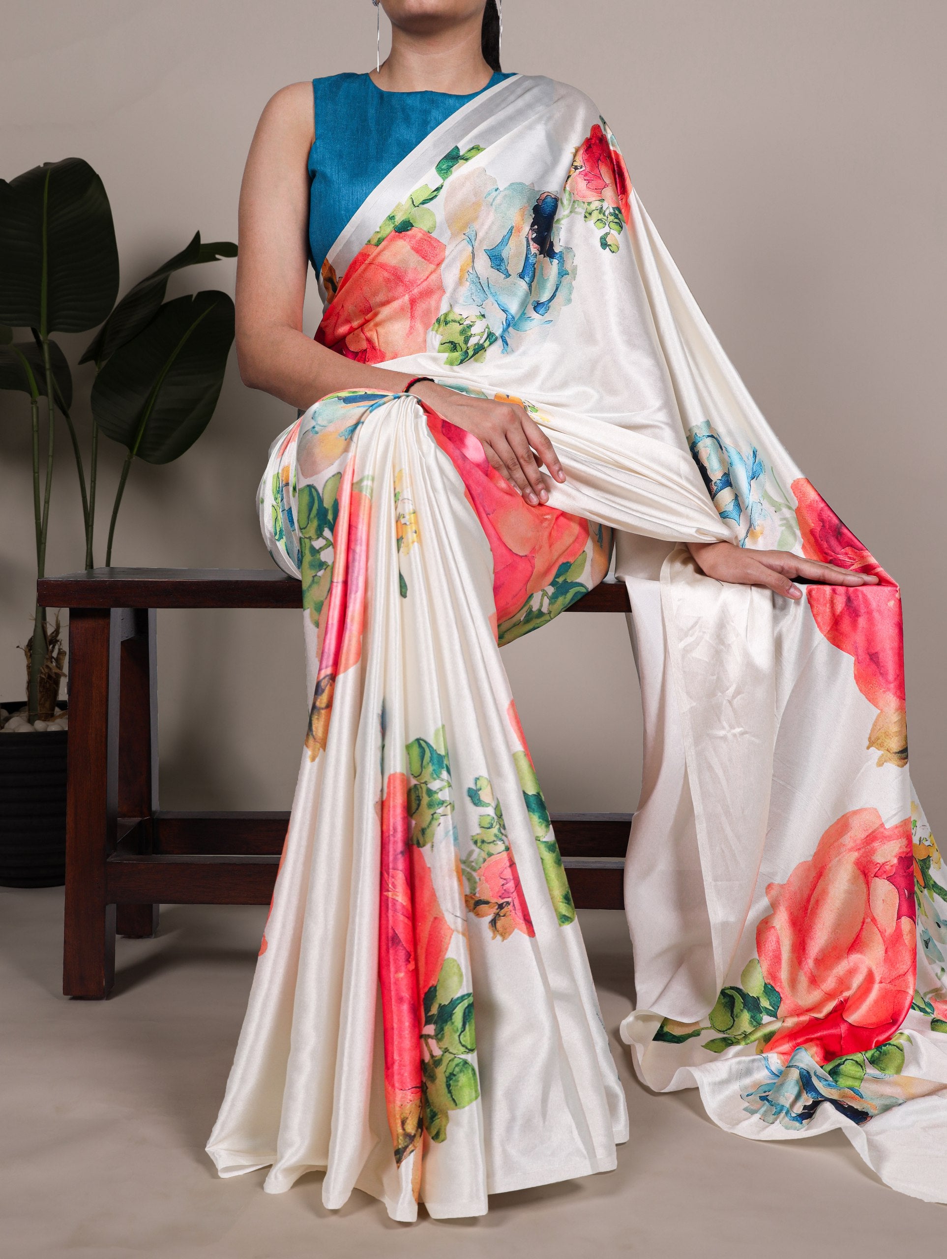A saree that blends floral charm with satin smoothness