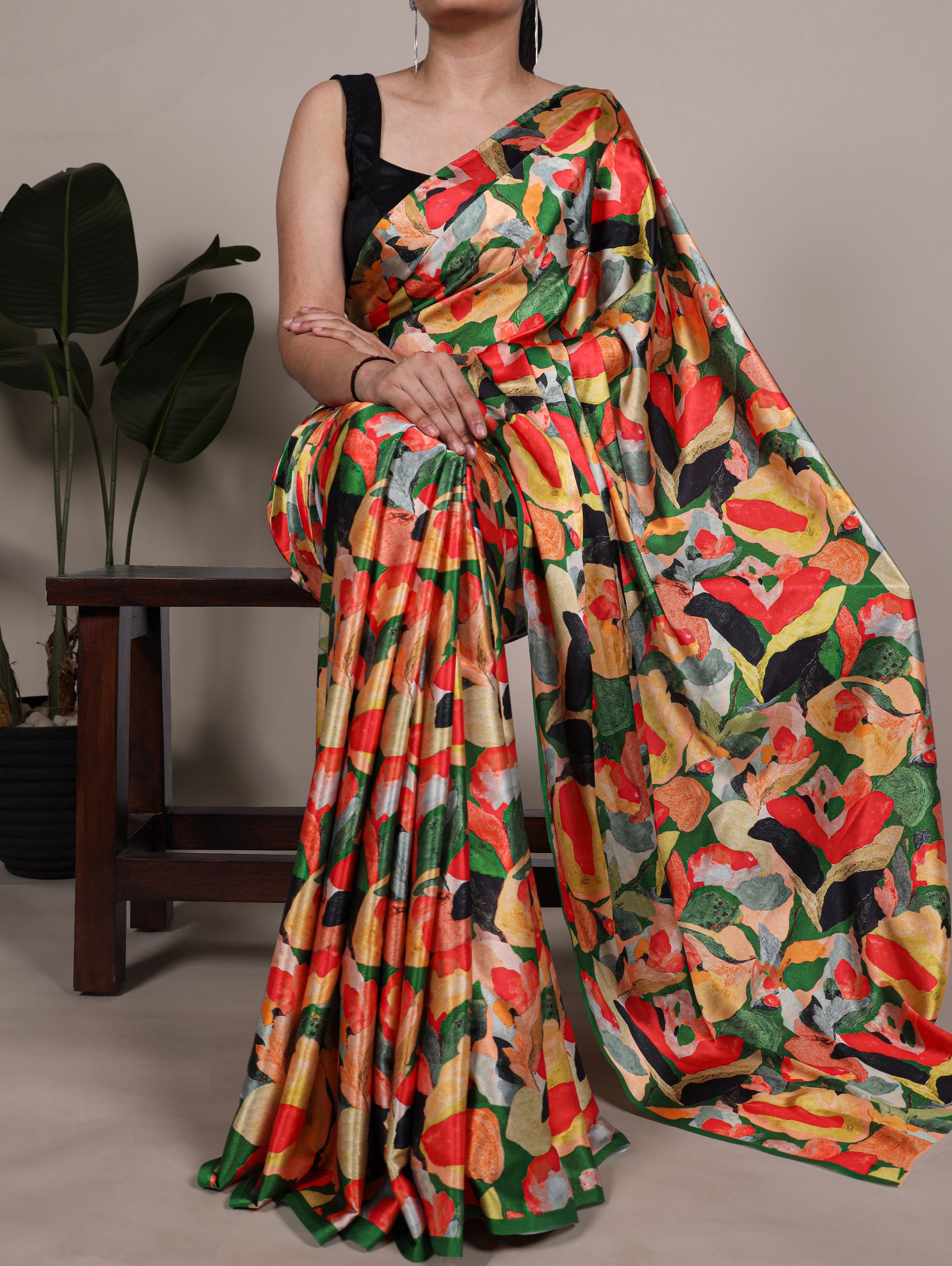 A saree that blends floral charm with satin smoothness