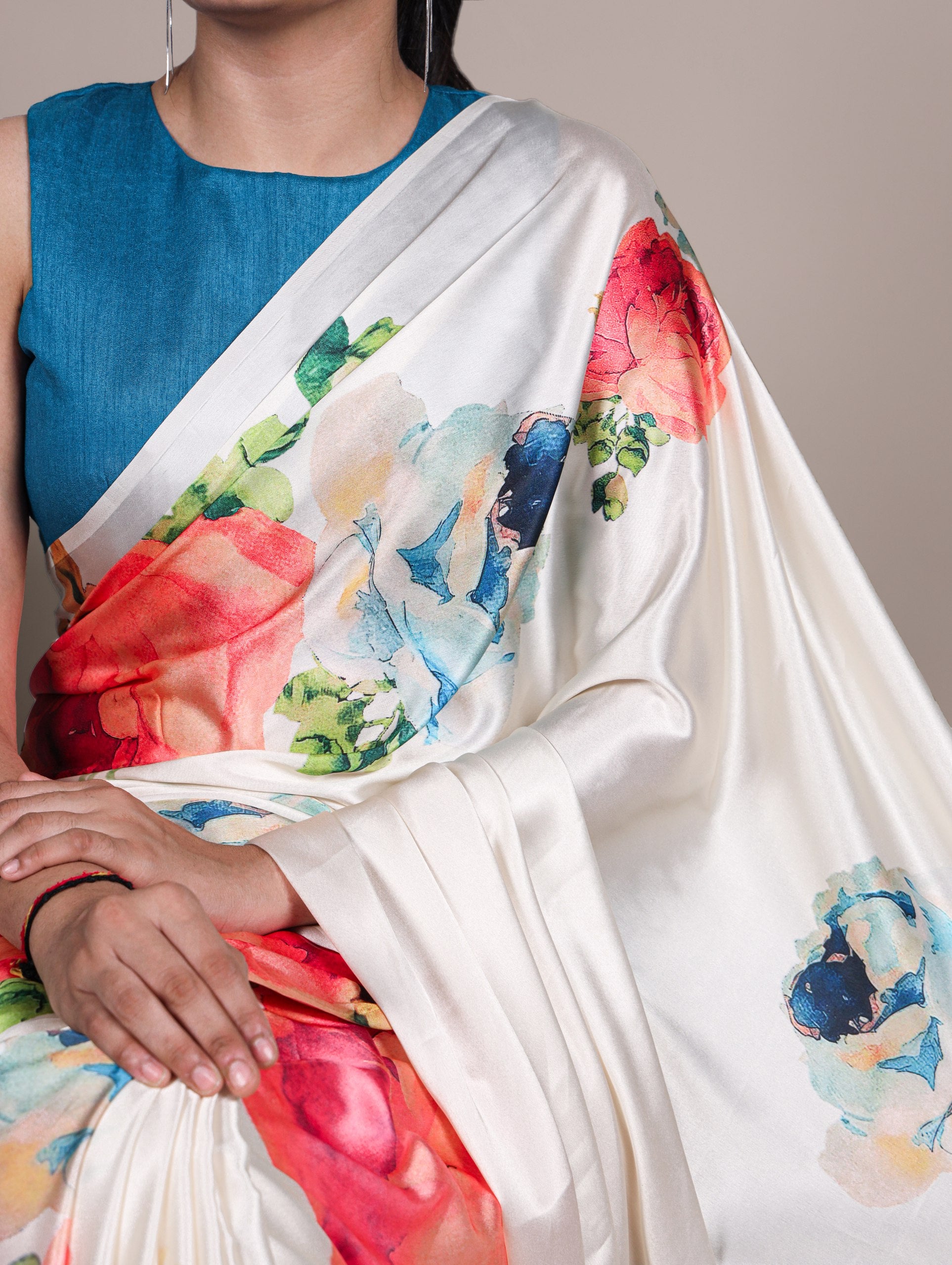 A saree that blends floral charm with satin smoothness