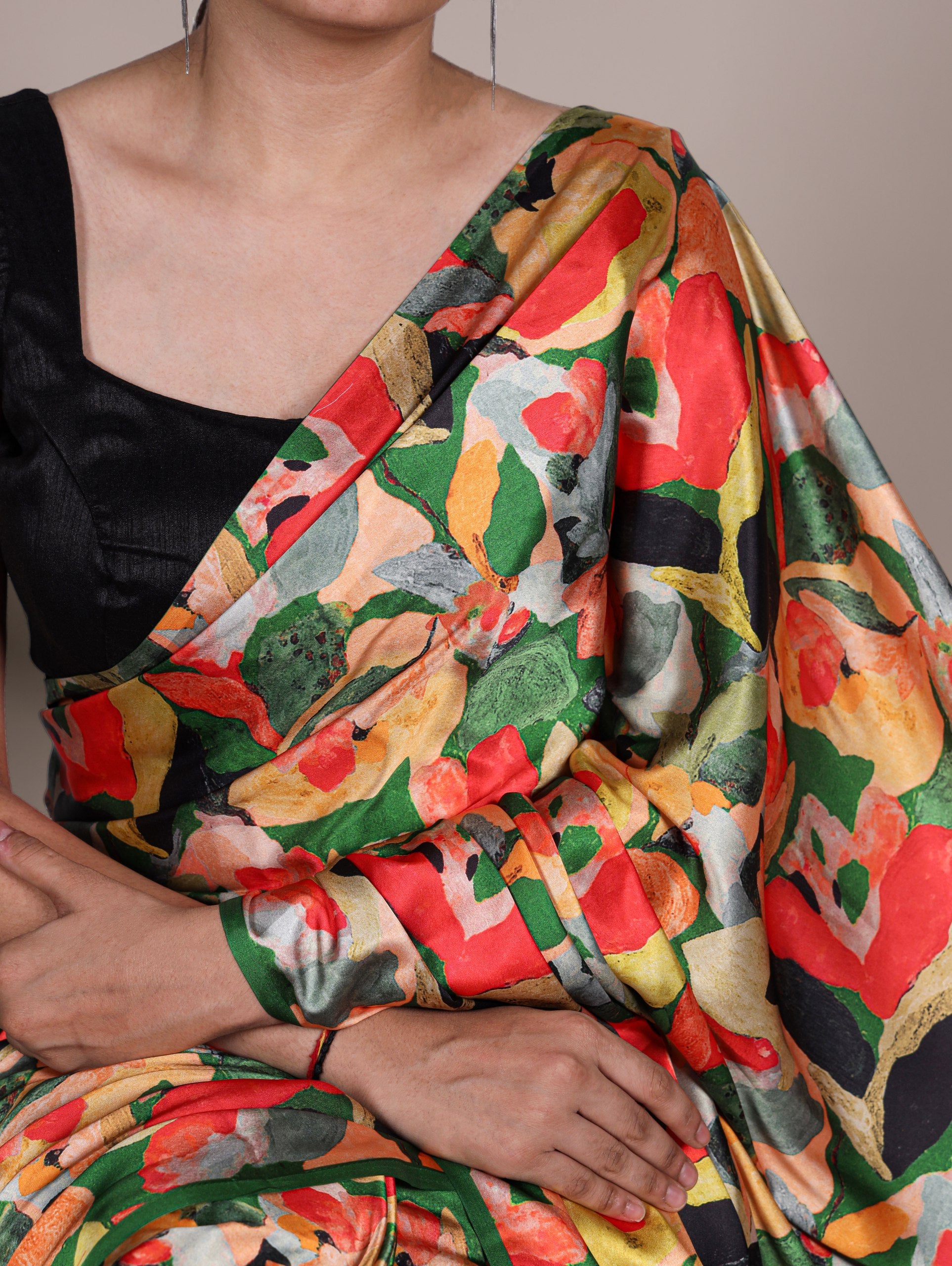 A saree that blends floral charm with satin smoothness