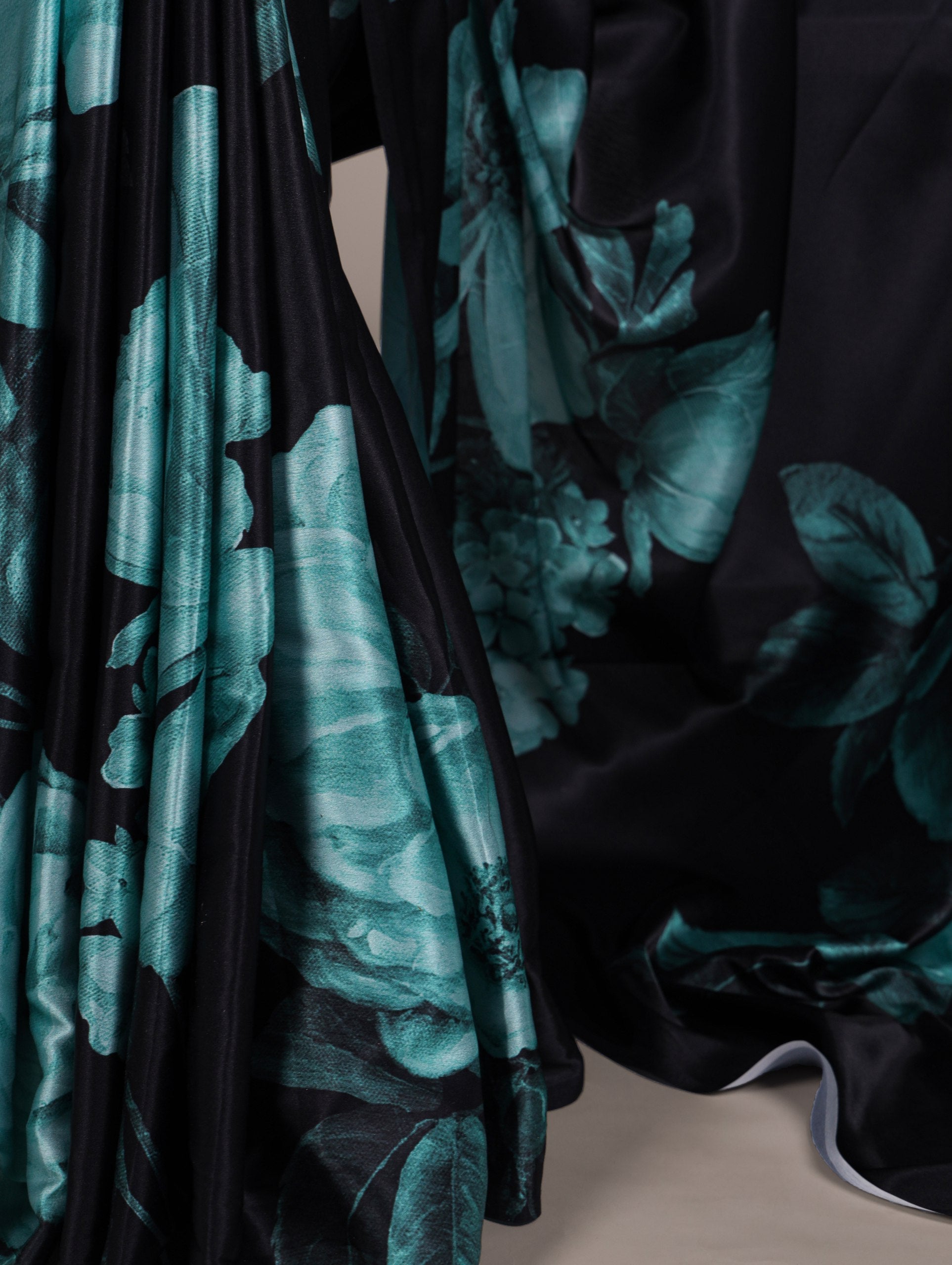 A saree that blends floral charm with satin smoothness