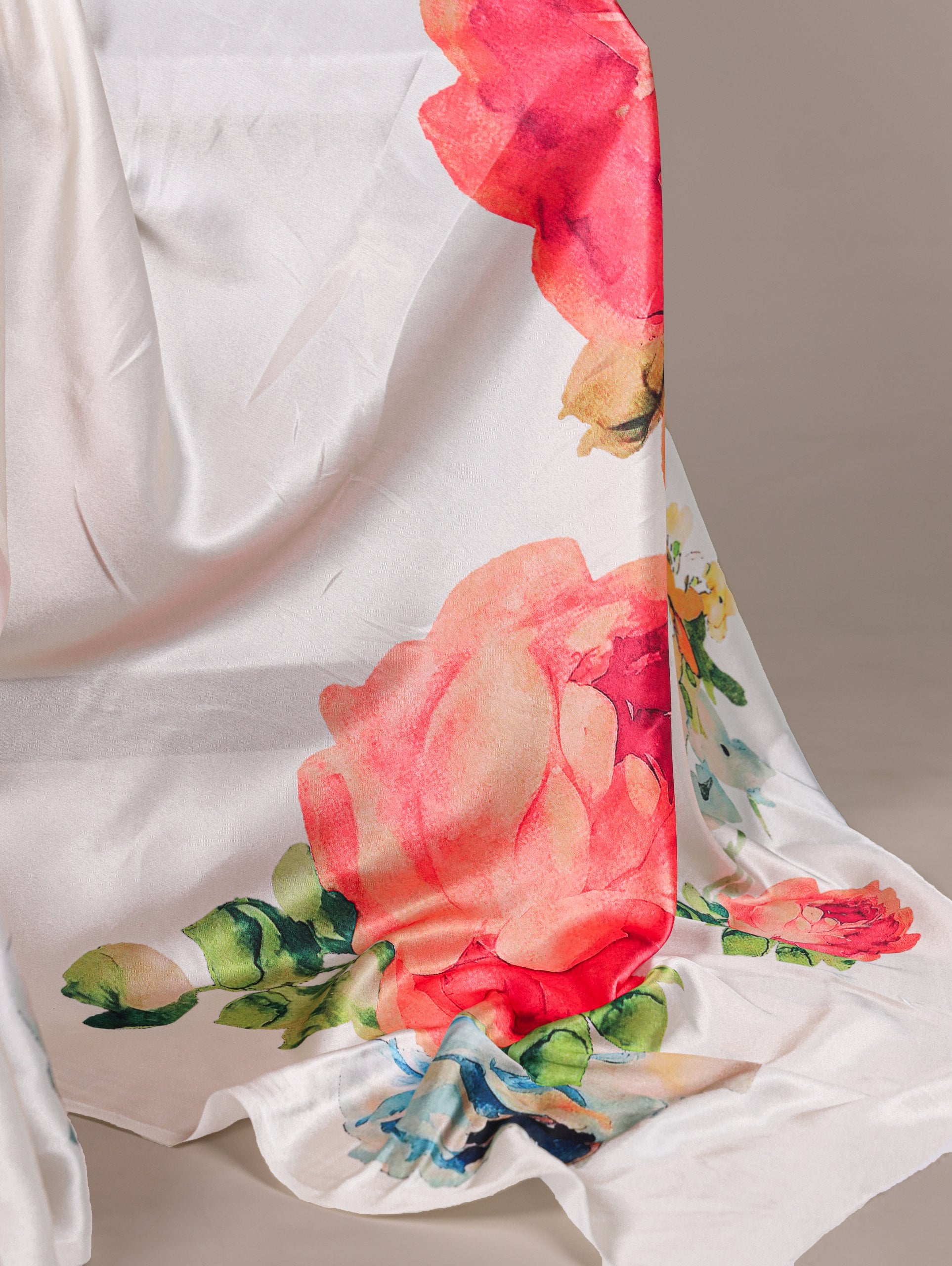 A saree that blends floral charm with satin smoothness